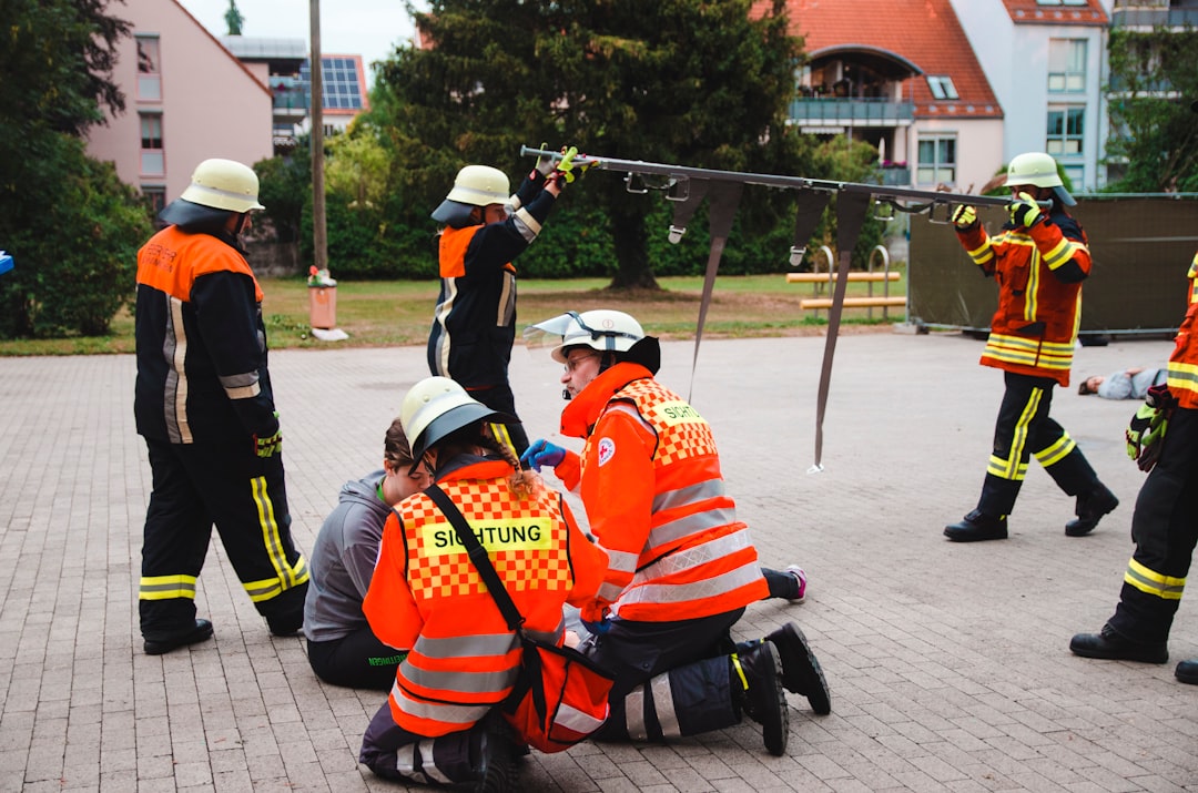 firemen performing drill outdoors